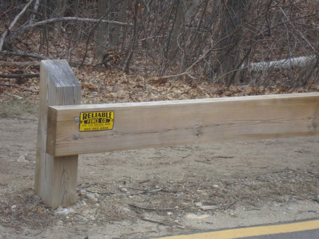 Commercial wood guardrail with eased edge Reliable Fence
