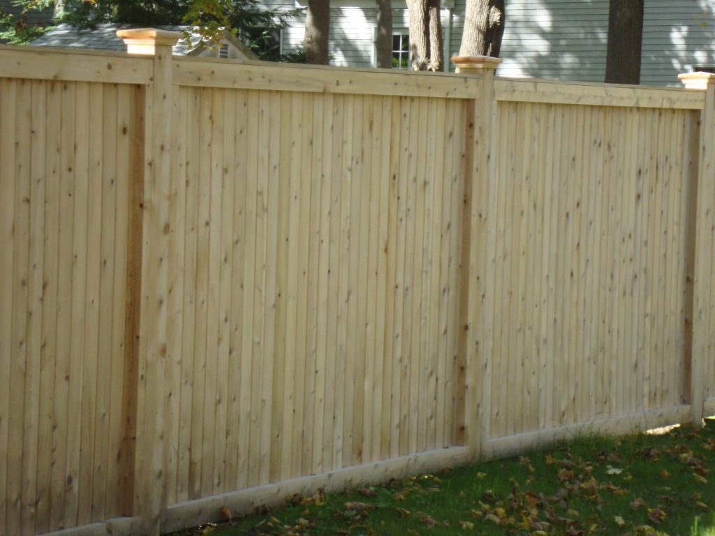 Universal tongue and groove fence with cedar colonial cap posts